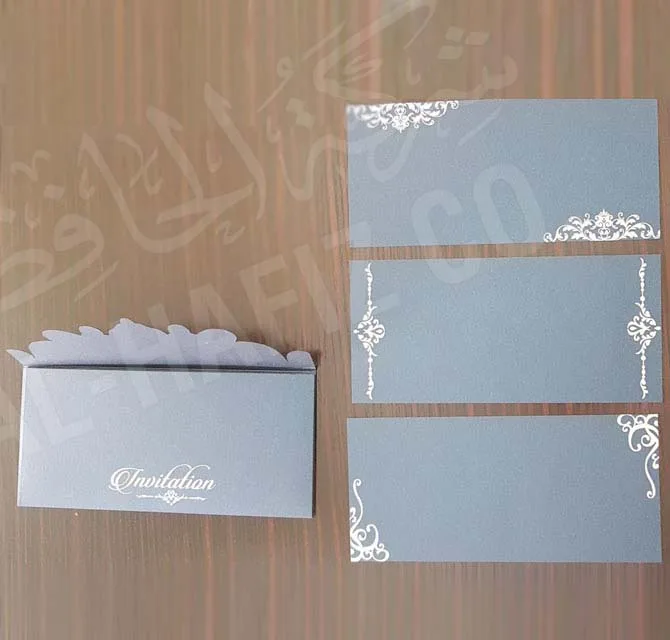 بطاقة دعوة رمادية بالقص بالليزر